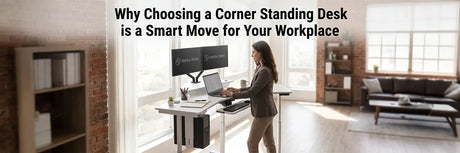 Woman working at a VersaDesk corner standing desk with dual monitor mount in a brick-accented home office