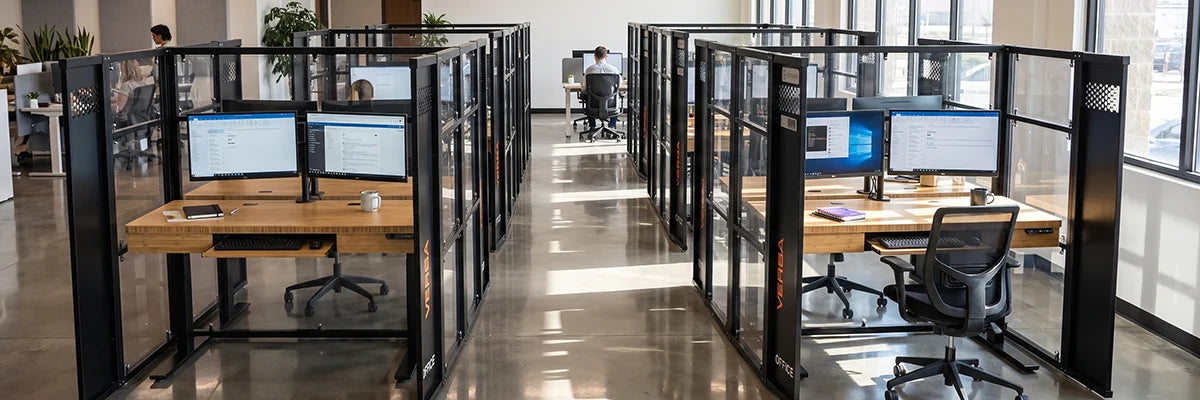 WorkNest glass office cubicles with sleek black frames creating structured yet open collaborative workspace environment
