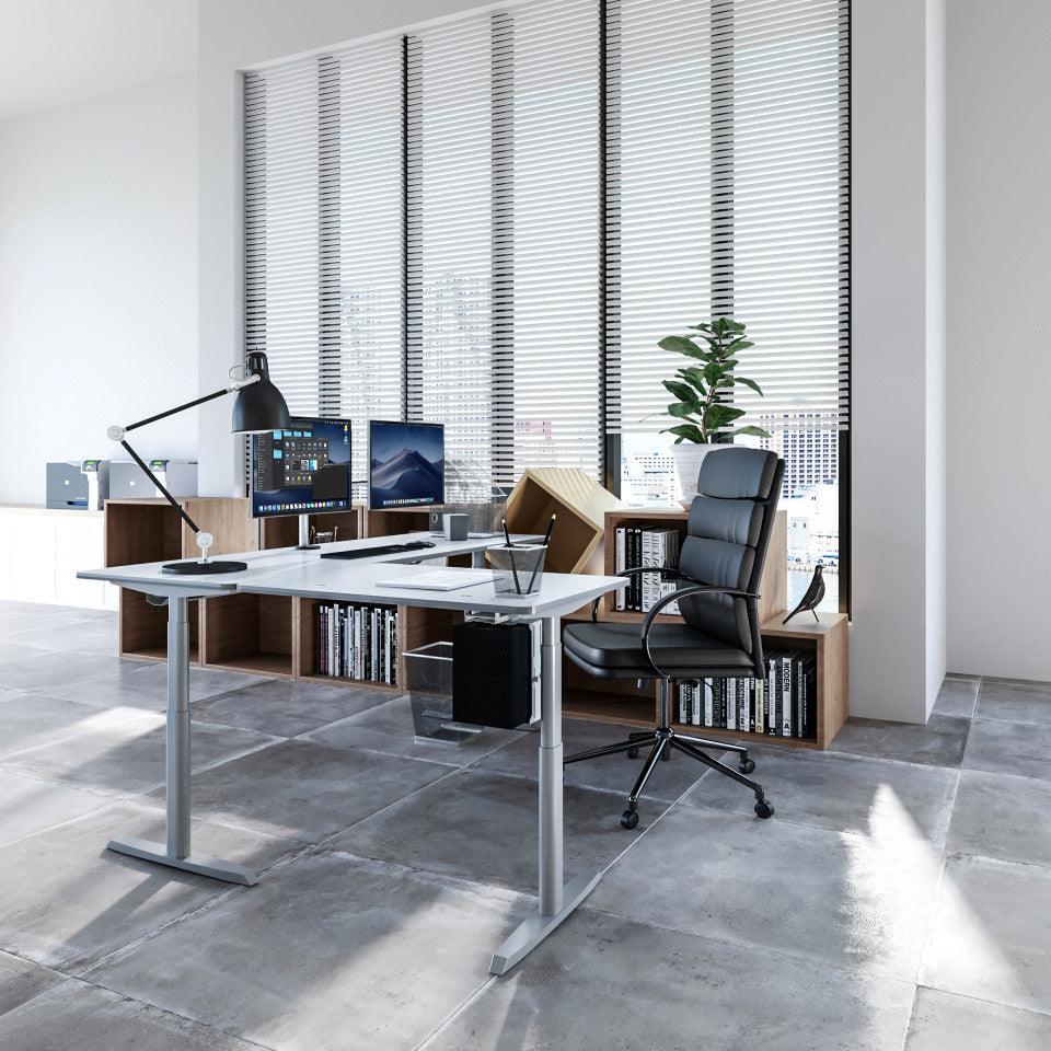 L-shaped standing desk ergonomic office setup VersaDesk adjustable workstation