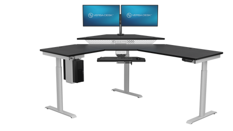 Corner trading desk with multiple monitors and electric standing workstation