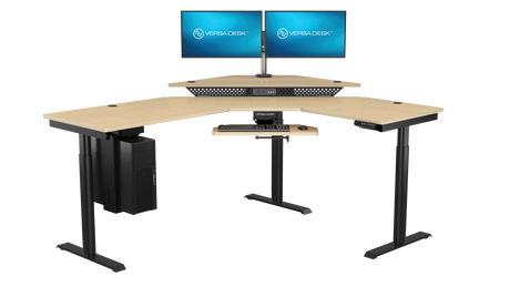 Adjustable gaming desk with dual screens and ergonomic room layout