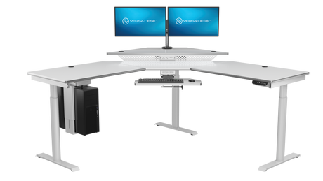 Dual display office setup on height adjustable standing desk workstation